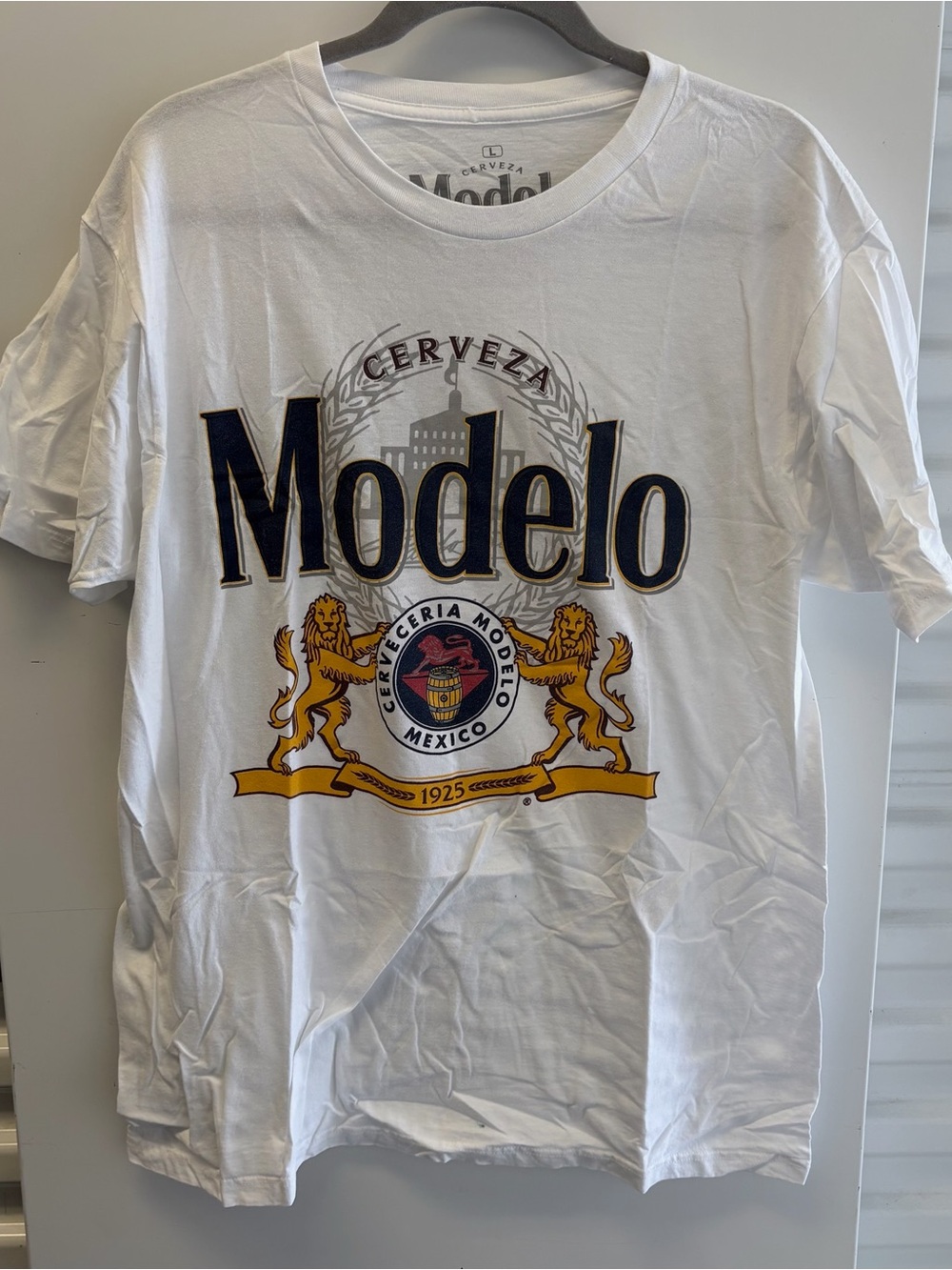 Ripple Junction White Tee with Navy and Gold Modelo Graphic